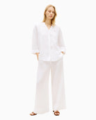 Woman wearing Tommy Hilfiger linen collarless shirt white full length – Áines Boutique
