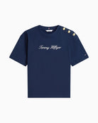 Front view of Tommy Hilfiger relaxed-fit t-shirt with gold shoulder buttons