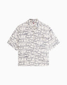 Graphic print detail on beige linen shirt – Áines Boutique
