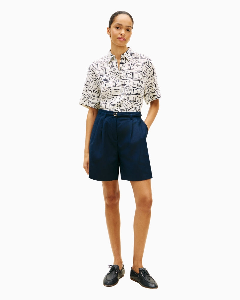 Short sleeve linen shirt styled with navy trousers – Áines Boutique