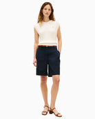 Woman wearing Tommy Hilfiger navy chino shorts front view – Áines Boutique