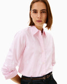 Close-up of cotton Oxford weave and button front