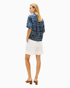 Short sleeve linen shirt styled with white trousers – Áines Boutique
