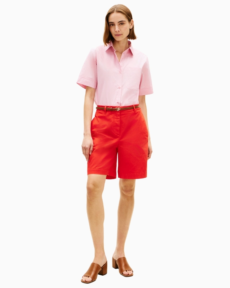 Woman wearing Tommy Hilfiger red chino shorts front view – Áines Boutique