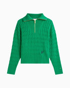 Detail of Tommy Hilfiger script embroidery and flag logo