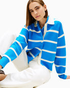 Close-up of wool blend knit texture and navy stripe detail