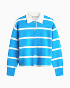 Detail of Tommy Hilfiger logo on striped sweater