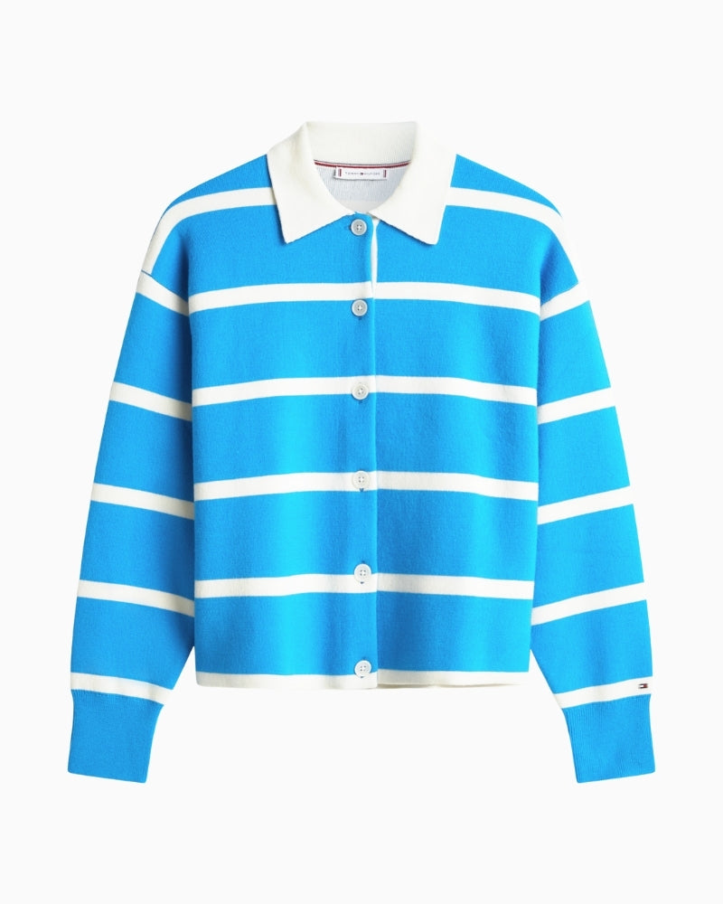 Detail of Tommy Hilfiger logo on striped sweater