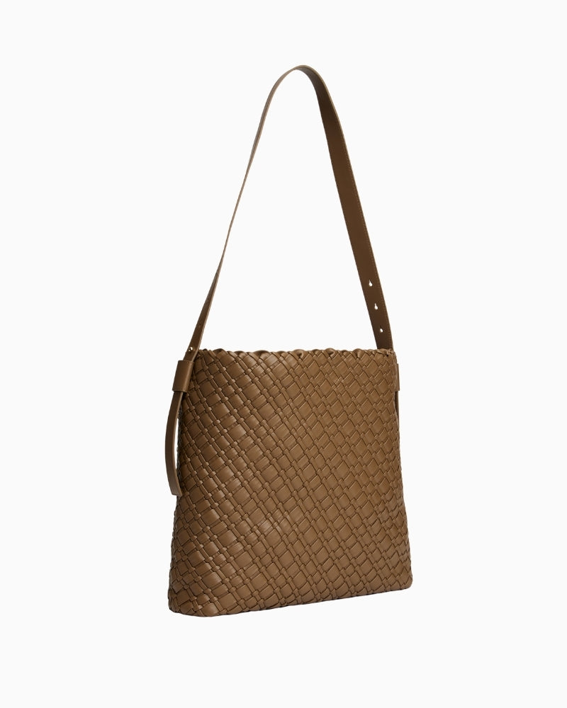 Side view showing roomy structure of braided maxi hobo bag