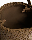 Interior of brown TH hobo bag with ample space for daily essentials