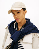 Woman wearing Tommy Hilfiger TH embroidered cap neutral – Áines Boutique