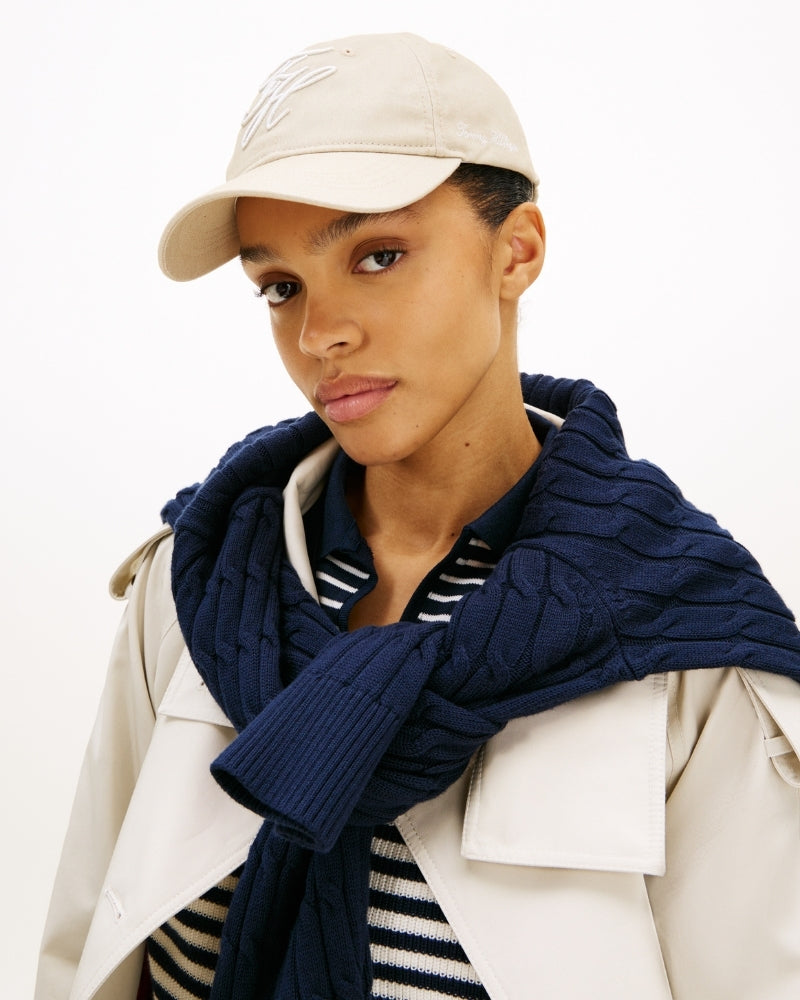 Woman wearing Tommy Hilfiger TH embroidered cap neutral – Áines Boutique