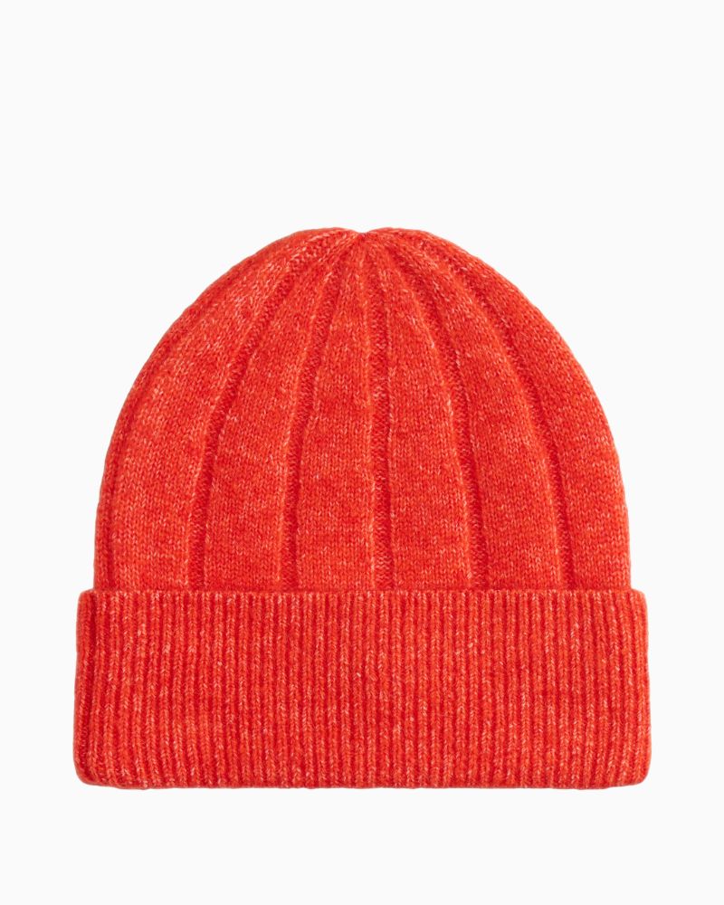 Back view of bright orange Tommy beanie showing soft texture and snug fit