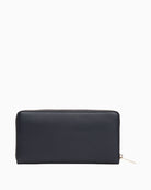 Back view of navy Tommy wallet with zip closure and slim profile