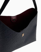 Interior of shoulder bag showing space for daily essentials