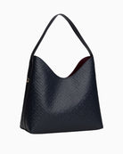 Back view of compact icon bag with adjustable strap