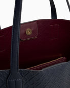 Interior of Tommy Hilfiger tote showing roomy open space
