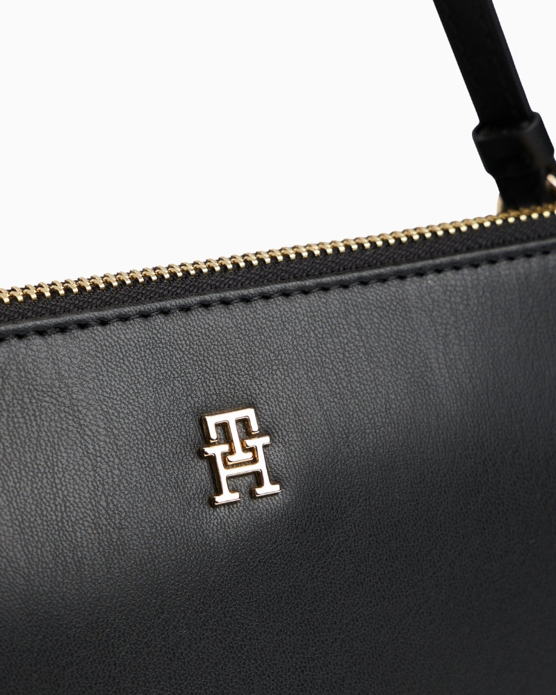 Compact pouch in black with detachable strap and smooth finish