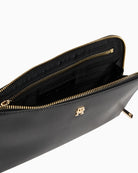 Interior of black wristlet pouch for phone, cards and keys