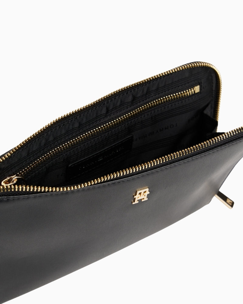 Interior of black wristlet pouch for phone, cards and keys