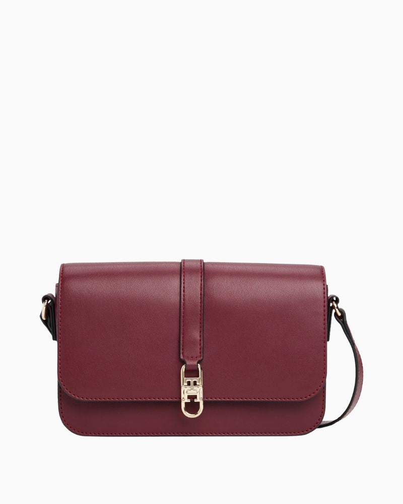 Tommy Hilfiger deep rouge flap crossover bag with adjustable strap and logo detail