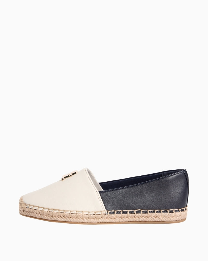Cream and navy Tommy Hilfiger TH logo leather espadrille angled view on white background – Áines Boutique