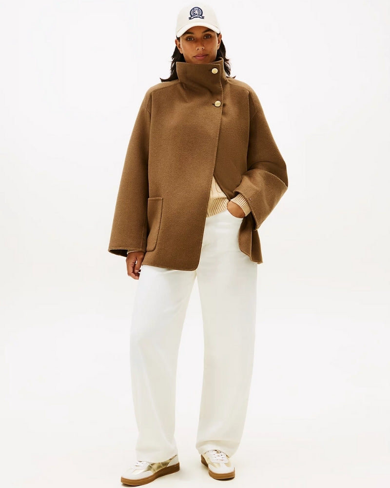 Profile view of low-top trainer showing metallic quilted panels