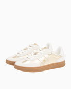 Detail of mixed textures and contrast midsole on leather trainers