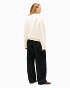 Back view of sweatshirt with rib-knit hem and cuffs