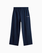 Detail of wide-leg silhouette and soft cotton texture