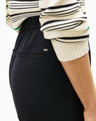 Close-up of waistband and soft wool-blend fabric