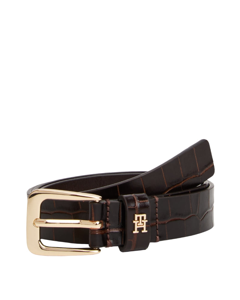 Close-up of croc texture and silver buckle