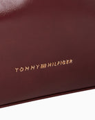 Tommy Hilfiger TH Modern Shoulder Bag in Burgundy glossy finish close-up