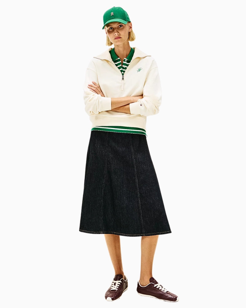 Woman wearing Tommy Hilfiger terry half-zip jumper in cream, styled with skirt – Áines Boutique