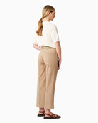 Toni Sue 7/8 trousers sand, woman wearing back view – Áines Boutique