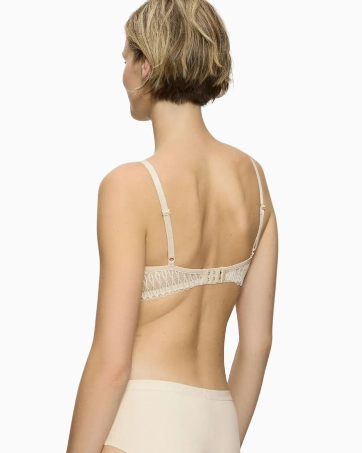 Back view highlighting lace-trimmed wings on Triumph Aura Spotlight bra