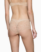 Back view of nude beige shorty briefs with modern design