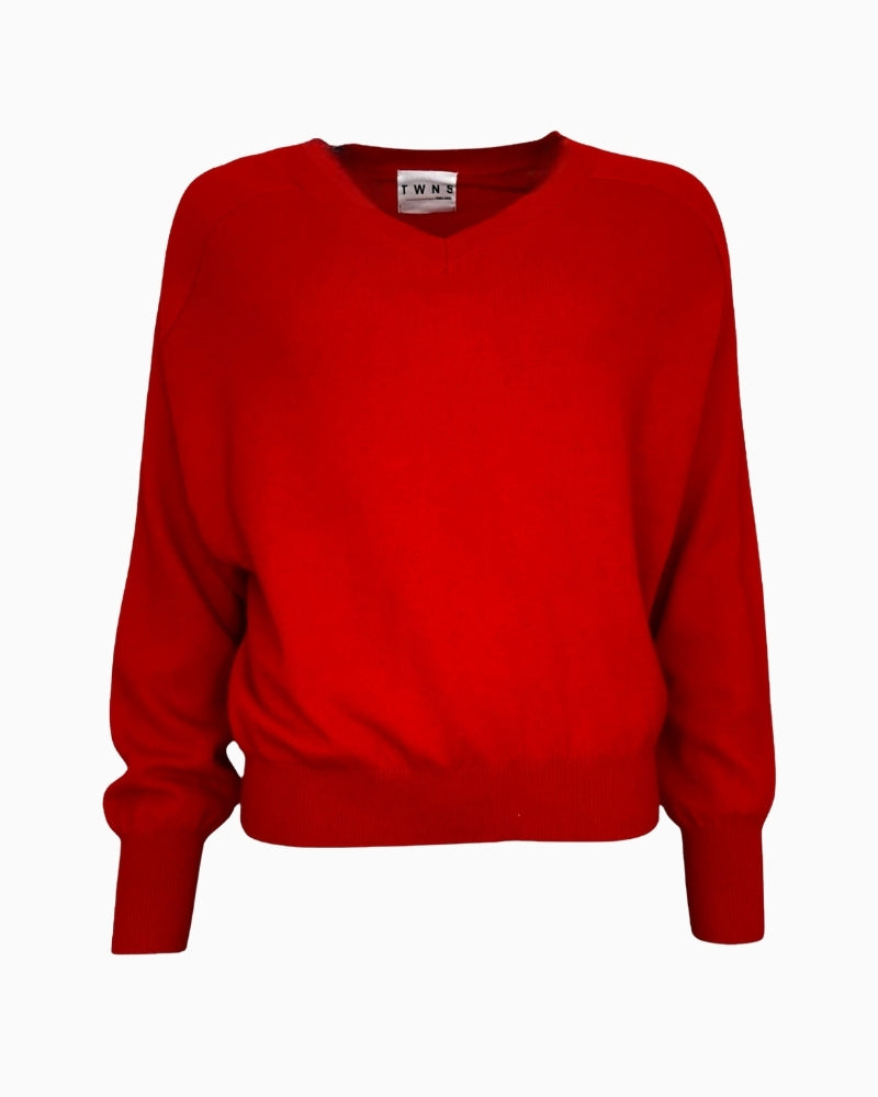 Soft V-neck knit sweater by TWNS with fitted hem and long sleeves