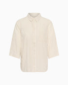 Two CindiePW Shirt in natural flat lay buttoned sleeve  front view