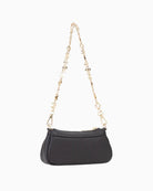 Small faux leather handbag in black with compact design