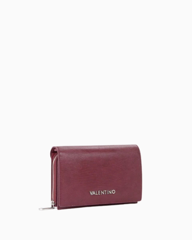 Side view of Ember clutch showing slim profile and refined finish