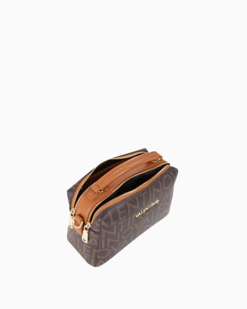 Close-up of grain-effect finish and tonal jacquard branding on shoulder strap