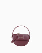 Front view of Miriade Wannabe Re Pattina bag with gold logo and structured flap