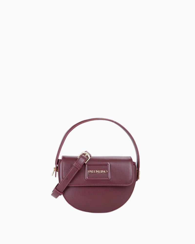 Front view of Miriade Wannabe Re Pattina bag with gold logo and structured flap