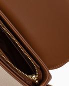 Valentino natural shoulder bag interior compartments view