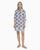 Woman wearing Vilagallo toucan palm print dress blue and white – Áines Boutique