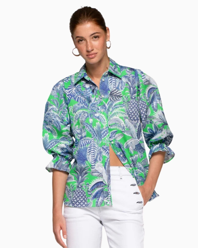 Woman wearing Vilagallo tropical leaf print shirt green and blue – Áines Boutique