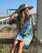 Woman wearing Vilagallo tropical print shirt dress green and blue – Áines Boutique