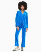 Styled with matching blazer for a bold statement look
