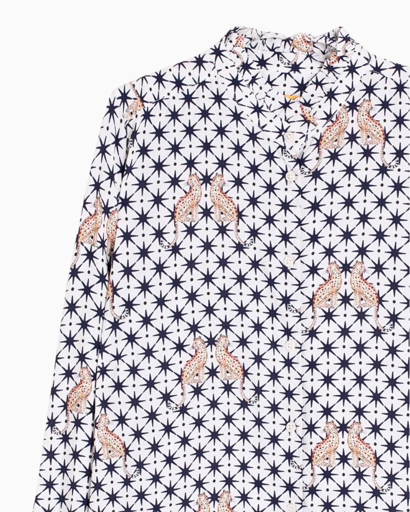 Close-up of leopard and star illustration on viscose fabric